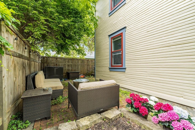 688 S 5th St, Columbus, OH 43206 - fenced backyard featuring outdoor lounge area and a patio