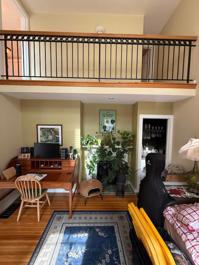 688 S 5th St, Columbus, OH 43206 - living area with a towering ceiling and wood finished floors