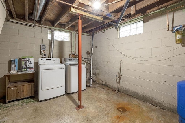 11 Mermary Dr, Fredericktown, OH 43019 - below grade area featuring washing machine and dryer and a water pressure tank
