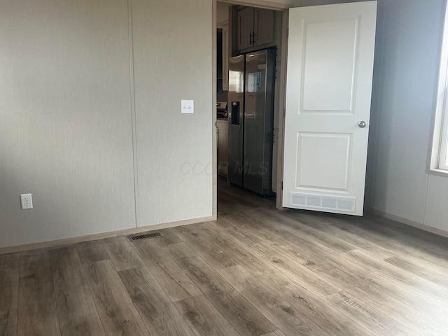 8565 Smith Calhoun Rd Unit 48, Plain City, OH 43064 - unfurnished room featuring wood finished floors and baseboards