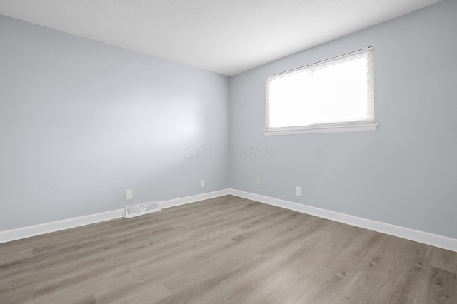 4980 Comstock Dr, Columbus, OH 43232 - empty room with light wood finished floors and baseboards