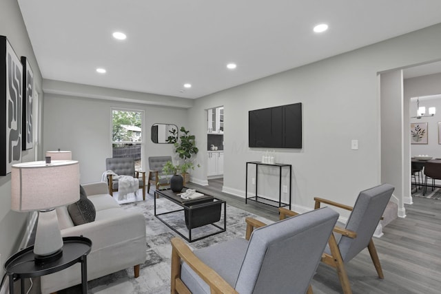 338 Gentlewind Dr, Westerville, OH 43081 - living area featuring wood finished floors, recessed lighting, and baseboards