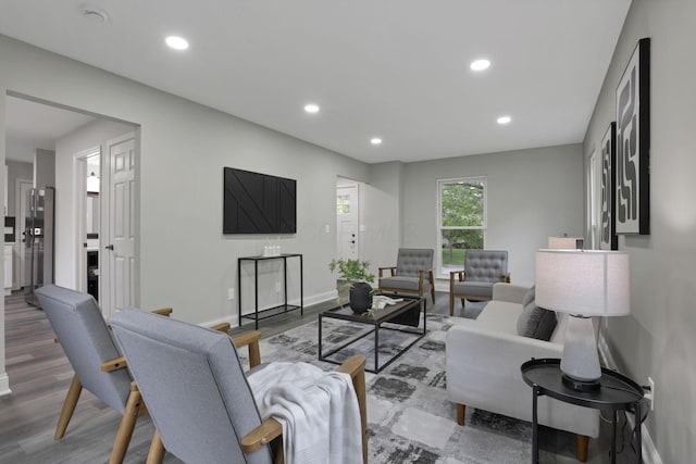 338 Gentlewind Dr, Westerville, OH 43081 - living room featuring wood finished floors, baseboards, and recessed lighting
