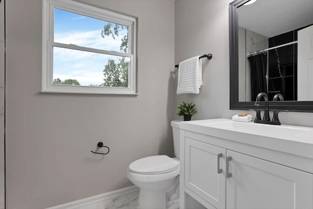 338 Gentlewind Dr, Westerville, OH 43081 - bathroom featuring marble finish flooring, vanity, baseboards, toilet, and a shower with shower curtain
