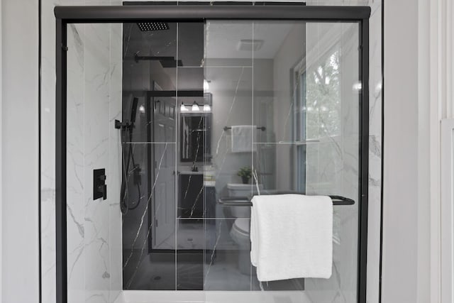 338 Gentlewind Dr, Westerville, OH 43081 - full bathroom featuring toilet and a marble finish shower