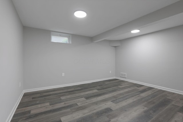 338 Gentlewind Dr, Westerville, OH 43081 - basement featuring dark wood-type flooring and baseboards