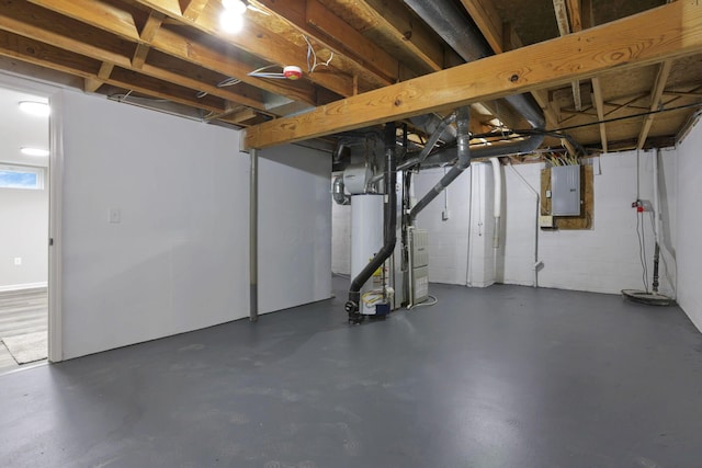 338 Gentlewind Dr, Westerville, OH 43081 - basement with electric panel, gas water heater, and drainage system