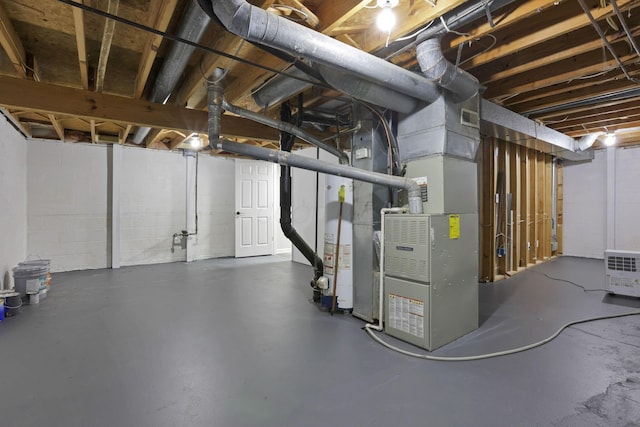 338 Gentlewind Dr, Westerville, OH 43081 - unfinished below grade area featuring heating unit and concrete block wall