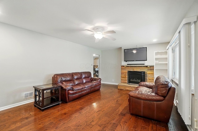 1096 Lancaster Ave, Reynoldsburg, OH 43068 - living room featuring a fireplace, wood finished floors, ceiling fan, baseboards, and recessed lighting