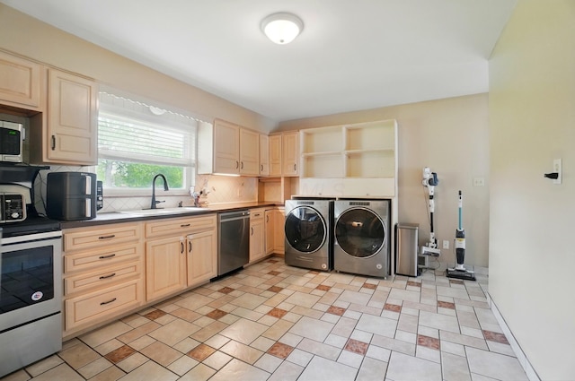 1096 Lancaster Ave, Reynoldsburg, OH 43068 - washroom with washer and clothes dryer