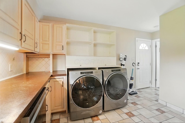 1096 Lancaster Ave, Reynoldsburg, OH 43068 - washroom featuring washing machine and clothes dryer and cabinet space