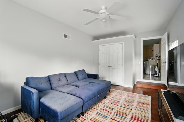 1096 Lancaster Ave, Reynoldsburg, OH 43068 - living area featuring baseboards, a ceiling fan, and wood finished floors