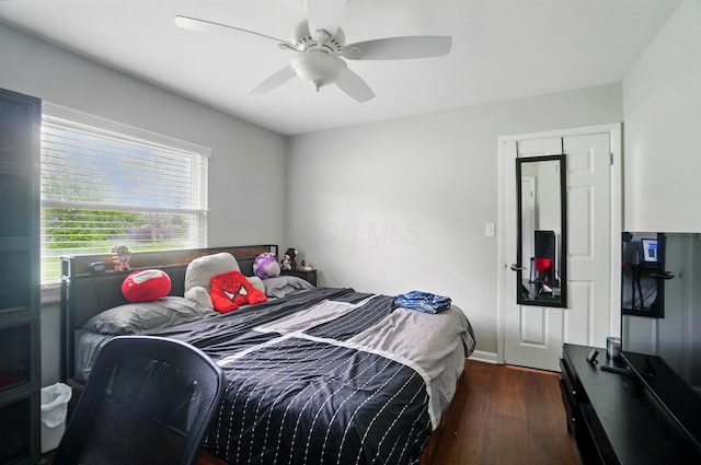 1096 Lancaster Ave, Reynoldsburg, OH 43068 - bedroom with dark wood-type flooring and ceiling fan