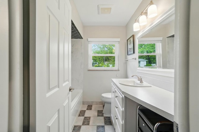 1096 Lancaster Ave, Reynoldsburg, OH 43068 - full bathroom featuring vanity, toilet, shower / bath combination, and baseboards