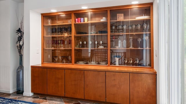 4171 Clotts Rd, Columbus, OH 43230 - bar featuring baseboards and stone finish flooring