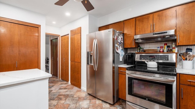 4171 Clotts Rd, Columbus, OH 43230 - kitchen with appliances with stainless steel finishes, under cabinet range hood, ceiling fan, brown cabinets, and recessed lighting