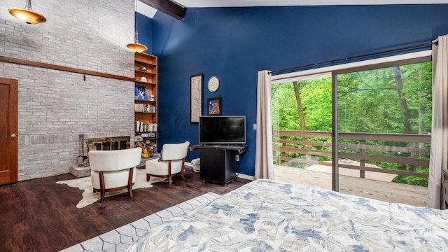 4171 Clotts Rd, Columbus, OH 43230 - bedroom with high vaulted ceiling, wood finished floors, baseboards, and access to exterior