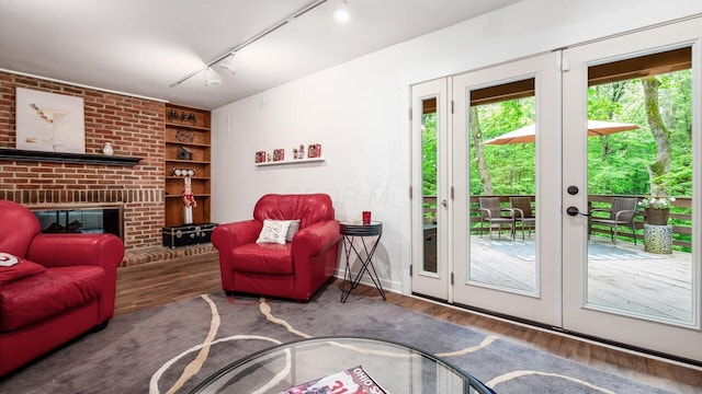 4171 Clotts Rd, Columbus, OH 43230 - living area with french doors, wood finished floors, rail lighting, and built in features