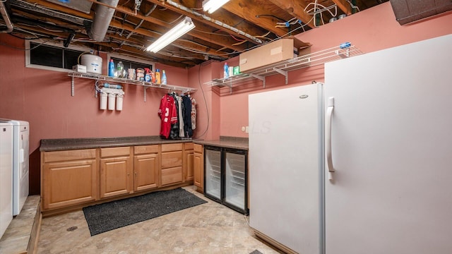 4171 Clotts Rd, Columbus, OH 43230 - below grade area featuring beverage cooler, bar area, and freestanding refrigerator