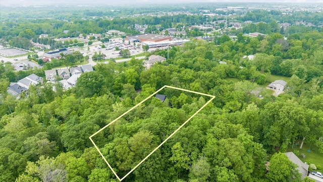 4171 Clotts Rd, Columbus, OH 43230 - aerial view of property and surrounding area featuring property parcel outlined and a heavily wooded area