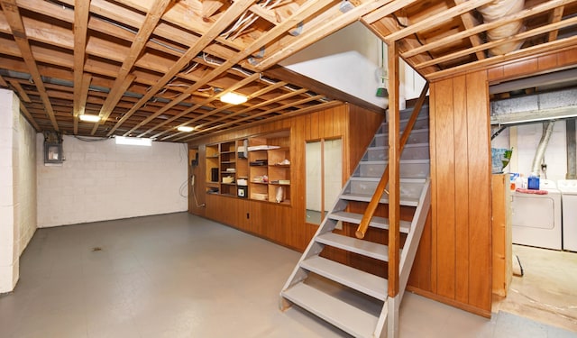 114 Highland Ave, Worthington, OH 43085 - unfinished basement with washing machine and dryer, stairs, and concrete block wall