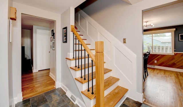 114 Highland Ave, Worthington, OH 43085 - stairs with wood finished floors and baseboards