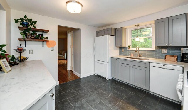 114 Highland Ave, Worthington, OH 43085 - kitchen with a sink, white appliances, gray cabinetry, and open shelves