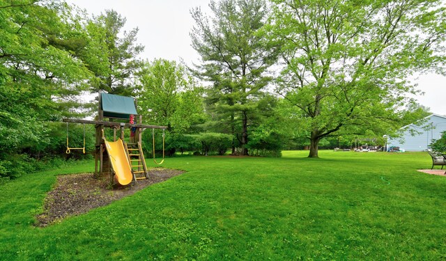114 Highland Ave, Worthington, OH 43085 - view of green lawn featuring a playground