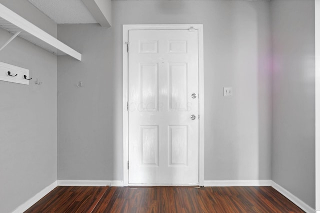 6446 Berry Pond Way, Canal Winchester, OH 43110 - mudroom featuring baseboards and dark wood-type flooring
