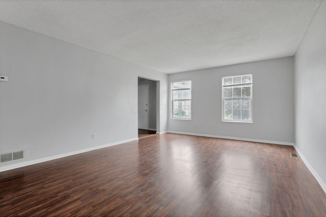 6446 Berry Pond Way, Canal Winchester, OH 43110 - unfurnished room featuring dark wood finished floors and baseboards
