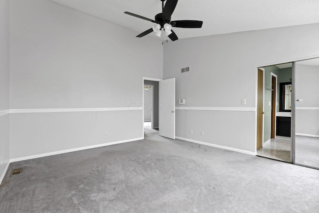 6446 Berry Pond Way, Canal Winchester, OH 43110 - unfurnished bedroom with carpet, baseboards, a ceiling fan, and high vaulted ceiling