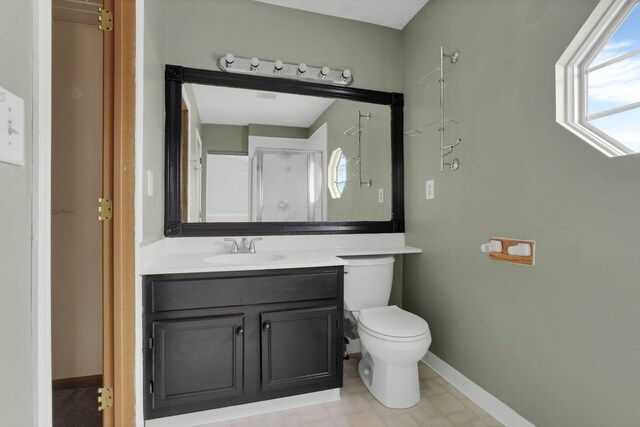 6446 Berry Pond Way, Canal Winchester, OH 43110 - bathroom featuring toilet, vanity, and baseboards