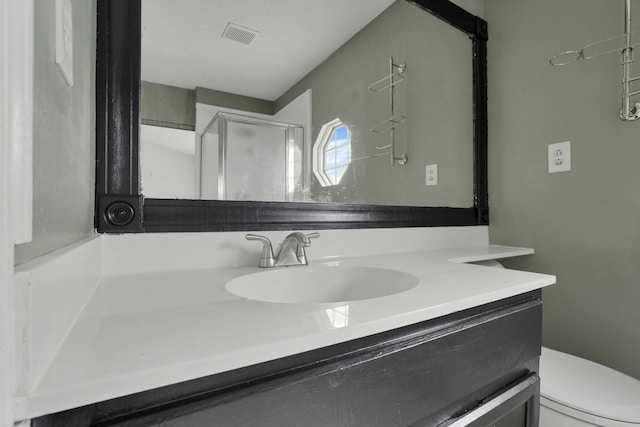 6446 Berry Pond Way, Canal Winchester, OH 43110 - bathroom featuring vanity, toilet, and a shower