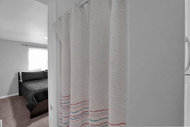 1508 Ives Ave, Reynoldsburg, OH 43068 - full bath featuring a shower with shower curtain and baseboards