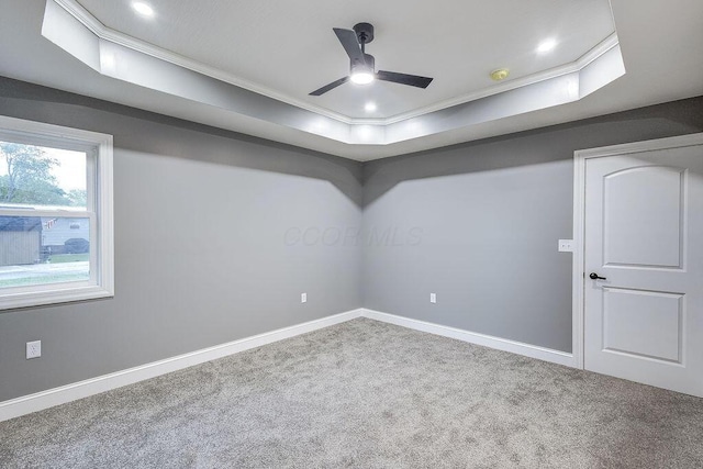 228 E Walnut St, Danville, OH 43014 - carpeted empty room featuring crown molding, ceiling fan, baseboards, a raised ceiling, and recessed lighting