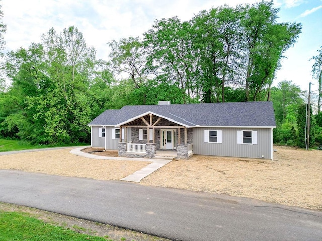 228 E Walnut St, Danville, OH 43014 - view of front of house with covered porch and stone siding
