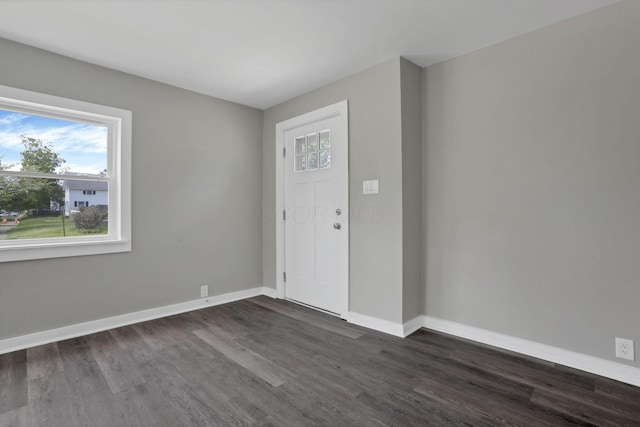 901 E Vine St, Mount Vernon, OH 43050 - foyer featuring plenty of natural light, dark wood-type flooring, and baseboards