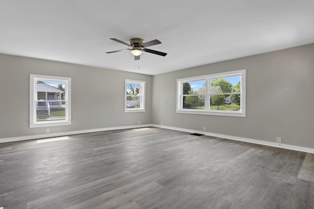 901 E Vine St, Mount Vernon, OH 43050 - spare room featuring ceiling fan, wood finished floors, and baseboards