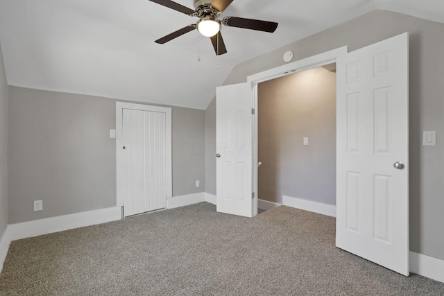 901 E Vine St, Mount Vernon, OH 43050 - unfurnished bedroom featuring vaulted ceiling, carpet floors, baseboards, a ceiling fan, and a closet