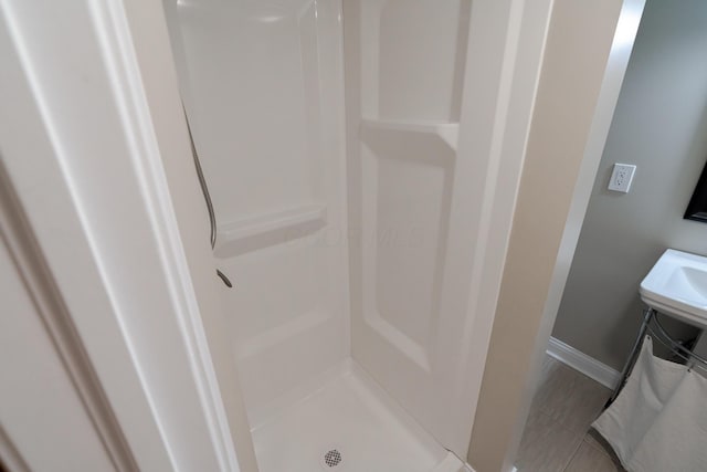2738 E Broad St, Columbus, OH 43209 - bathroom with a shower stall and baseboards