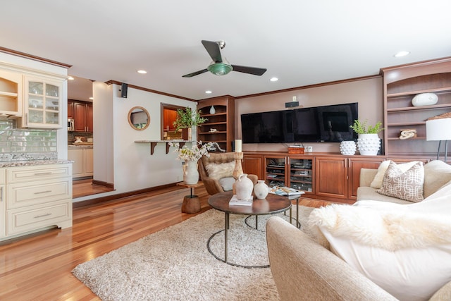 2738 E Broad St, Columbus, OH 43209 - living area with ornamental molding, ceiling fan, light wood-style flooring, and recessed lighting