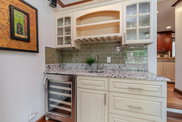 2738 E Broad St, Columbus, OH 43209 - indoor wet bar featuring beverage cooler and tasteful backsplash