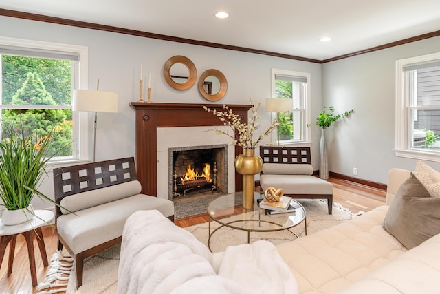 2738 E Broad St, Columbus, OH 43209 - living area with healthy amount of natural light, a high end fireplace, wood finished floors, crown molding, and recessed lighting