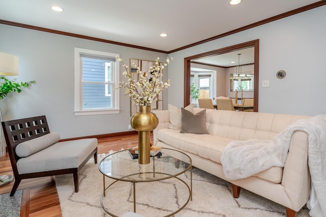 2738 E Broad St, Columbus, OH 43209 - living area with wood finished floors, ornamental molding, and recessed lighting