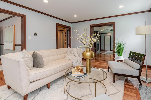 2738 E Broad St, Columbus, OH 43209 - living room with wood finished floors, recessed lighting, and ornamental molding