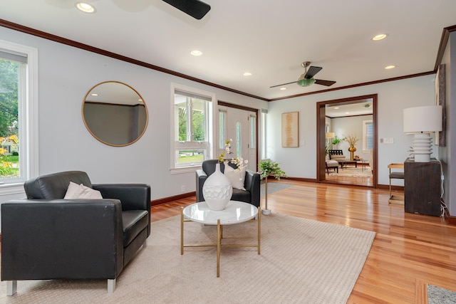 2738 E Broad St, Columbus, OH 43209 - living area featuring a ceiling fan, healthy amount of natural light, ornamental molding, light wood-style floors, and recessed lighting