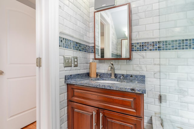 2738 E Broad St, Columbus, OH 43209 - bathroom featuring vanity and decorative backsplash