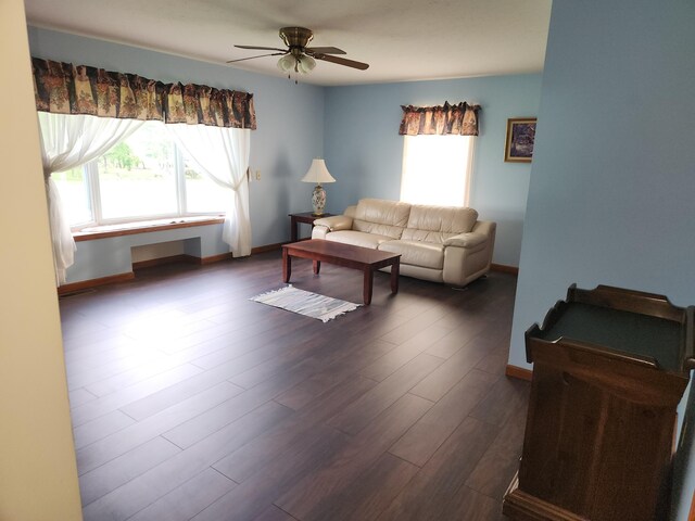 5747 E Clinton St, Albany, OH 45710 - living area with ceiling fan, dark wood-type flooring, and baseboards