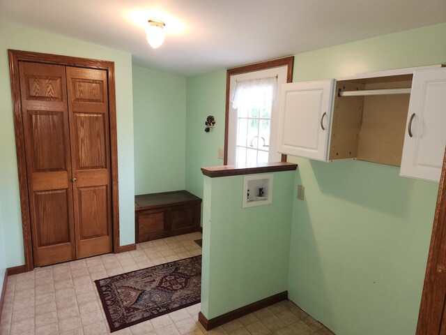 5747 E Clinton St, Albany, OH 45710 - laundry area with washer hookup, cabinet space, and baseboards