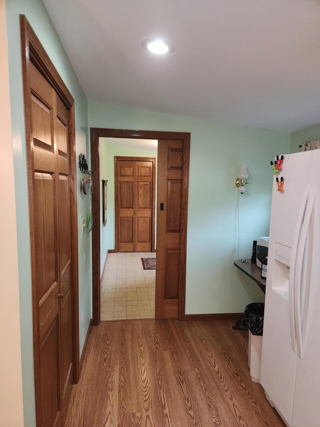5747 E Clinton St, Albany, OH 45710 - hall featuring wood finished floors and baseboards